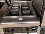 an image of a commercial fryer in a kitchen