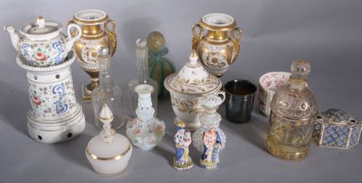 many different types of vases sitting on a table