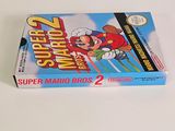 a box of super mario bros 2 on a table
