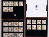 a display case with a lot of coins inside of it