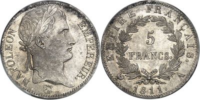 une pièce d'argent portant une tête de femme et des lauriers