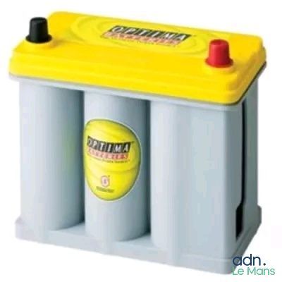 a close up of a yellow and blue car battery on a white background