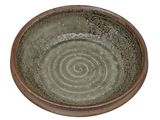 a green bowl with a spiral design on it