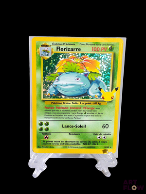 an image of a pokemon card with a picture of a lizard