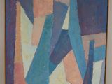 abstract painting on a wall in a room with white walls