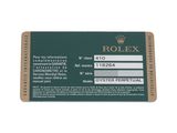 rolex date card with date and date on the back