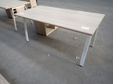 a table that is sitting in the middle of a room