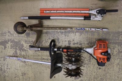 a lot of tools that are laying out on the floor