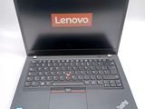 a laptop with a lenovo logo on the screen