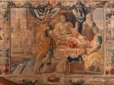 une tapisserie représentant un homme et une femme dans un lit