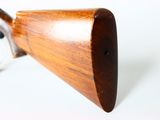 a small wooden object that is sitting on a table