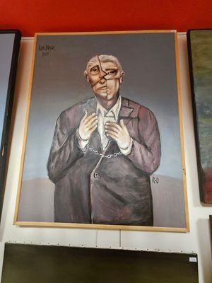 painting of a man in a suit and tie on a red wall
