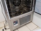 an image of a toaster oven with a microwave on top of it
