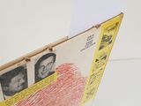 a box with a picture of a man and a woman inside of it
