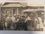 a group of people standing outside of a building