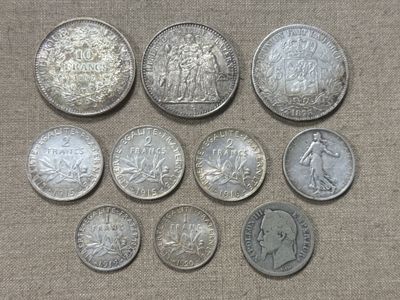 a close up of a bunch of coins on a table