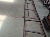 a train that is going down the tracks in the station