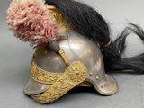 a helmet with a flower on top of it