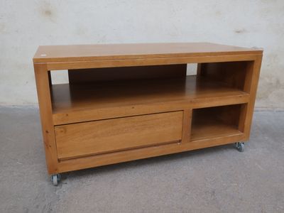 an image of a wooden tv stand with two drawers