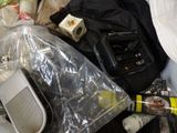 a pile of items that are sitting on the floor