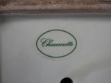 a close up of a plate with a name on it