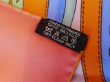 a close up of a tie with a label on it
