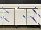 an image of a commercial freezer with four doors on wheels