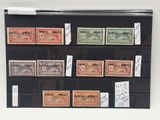 de nombreux timbres différents exposés dans une vitrine