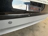 a sticker on the bumper of a car that says v pluto