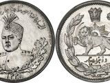 a close up of a coin with a lion on it