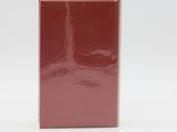 an image of a red vase on a white surface