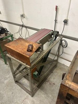 a picture of a workbench in a workshop with tools