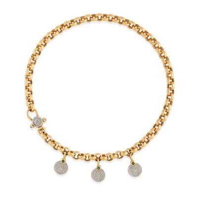 a close up of a gold chain bracelet with three charms