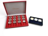 an image of a red box with six silver coins in it