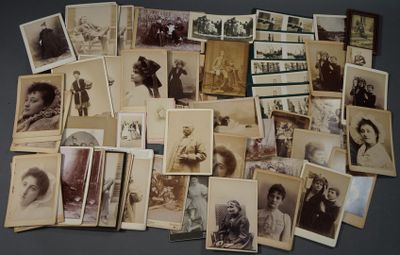 a lot of old photos of people on the table