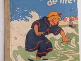 un vieux livre pour enfants avec l'image d'un garçon sur une planche de surf dans l'eau