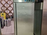a large stainless steel refrigerator in a kitchen next to other appliances