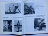 a book with pictures of people in military uniforms