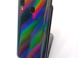the back of a phone with a multicolored design on it