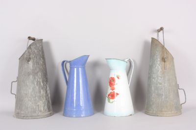 several different types of vases are lined up against a white wall
