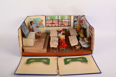 un livre ouvert contenant une maquette de salle de classe