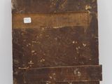 a close up of a piece of wood with a tag on it