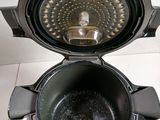 a close up of an air fryer on a counter