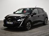 la voiture noire est garée sur le sol en damier d'une pièce