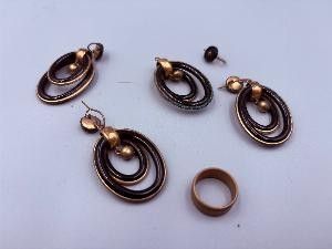 five different types of jewelry on a table