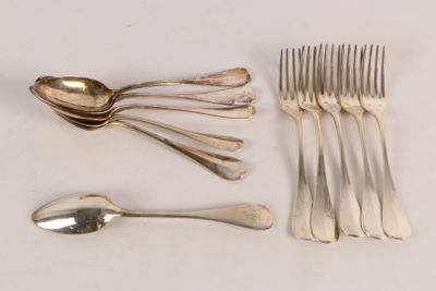 a lot of silver spoons and forks on the table