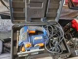 a tool box with tools in it sitting on the floor