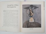 an open book with a picture of a woman wearing a hat