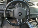 dashboard of a car with a steering wheel and dashboard controls