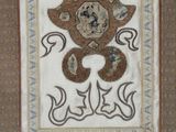 a picture of a rug with a teddy bear on it